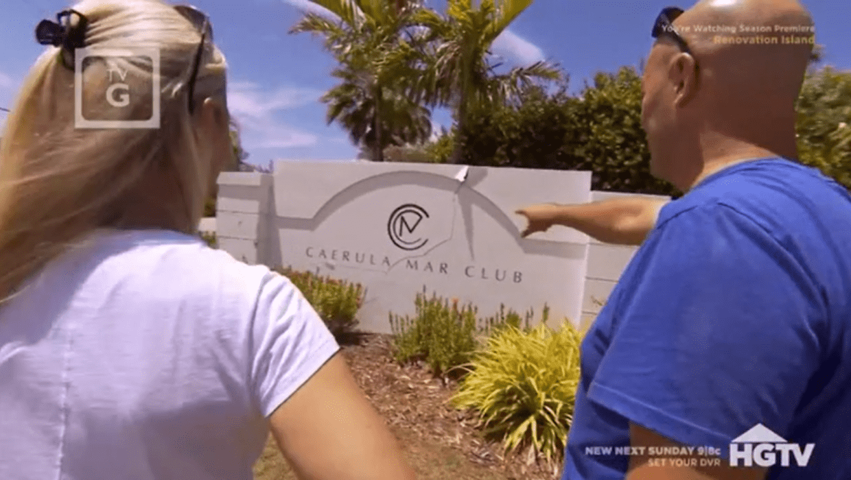 Sarah and Bryan checking out the damaged sign in 'Renovation Island' Season 4 (HGTV)