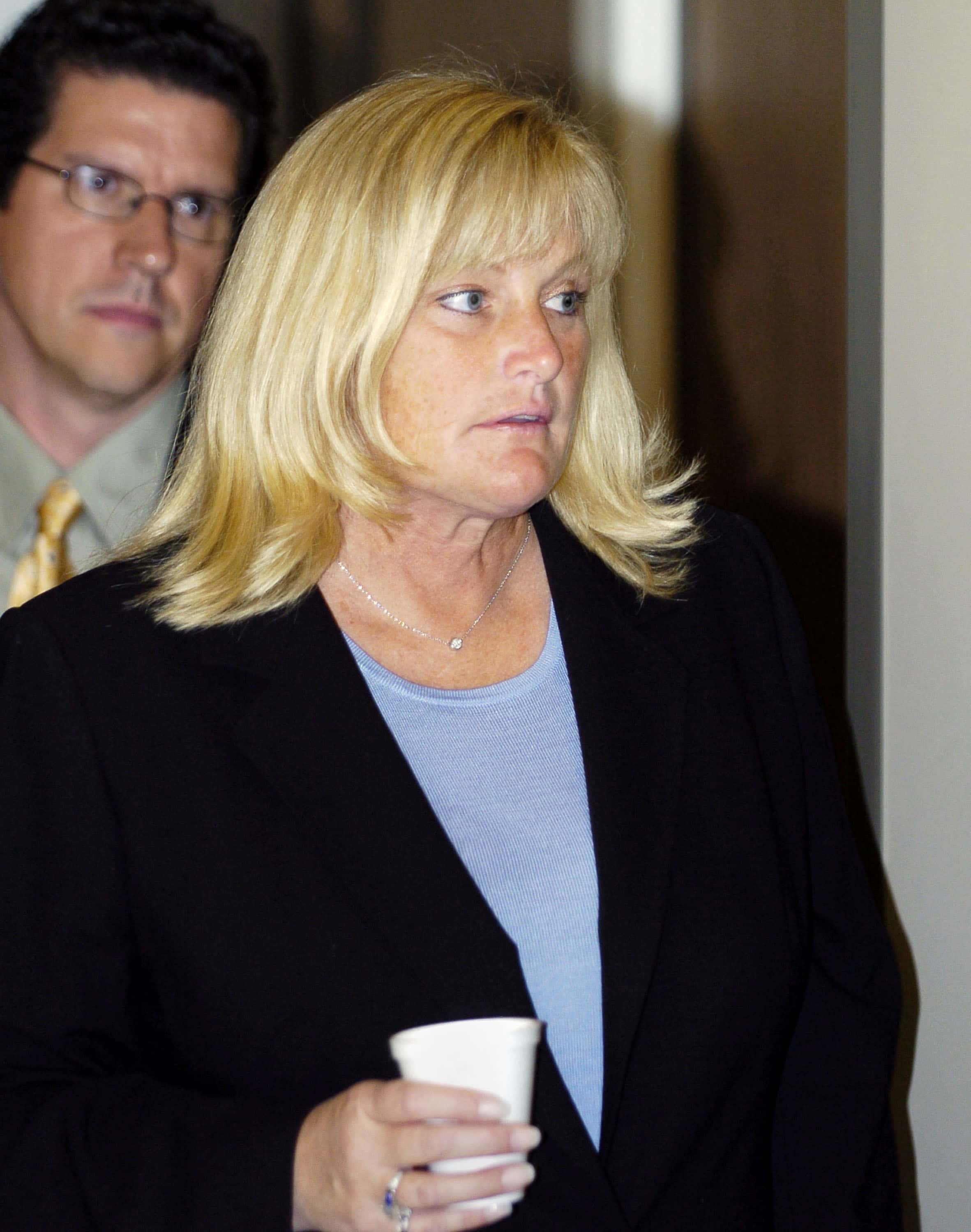 Debbie Rowe, Michael Jackson's ex-wife and mother of two of his children, steps from the courtroom during Jackson's child molestation trial at the Santa Barbara County courthouse April 28, 2005 in Santa Maria, California. Jackson is charged in a 10-count indictment with molesting a boy, plying him with liquor and conspiring to commit child abduction, false imprisonment and extortion.