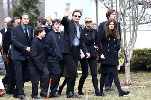 Actor Liam Neeson (waving) with sons Micheal Neeson (3L), and Daniel Neeson (2L), and Joely Richardson arrive for the funeral of actress Natasha Richardson at St. Peter's Lithgow Episcopal Church on March 22, 2009 in Lithgow, New York. Richardson died at Lenox Hill Hospital on March 18 in New York City after suffering a ski injury at the Mont Tremblant resort in Montreal.