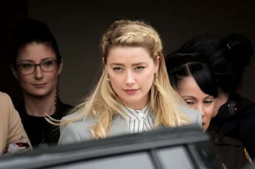 Actress Amber Heard departs the Fairfax County Courthouse on May 27, 2022 in Fairfax, Virginia.&nbsp;Closing arguments in the Depp v. Heard defamation trial, brought by Johnny Depp against his ex-wife Amber Heard, concluded today and jury deliberations begin.