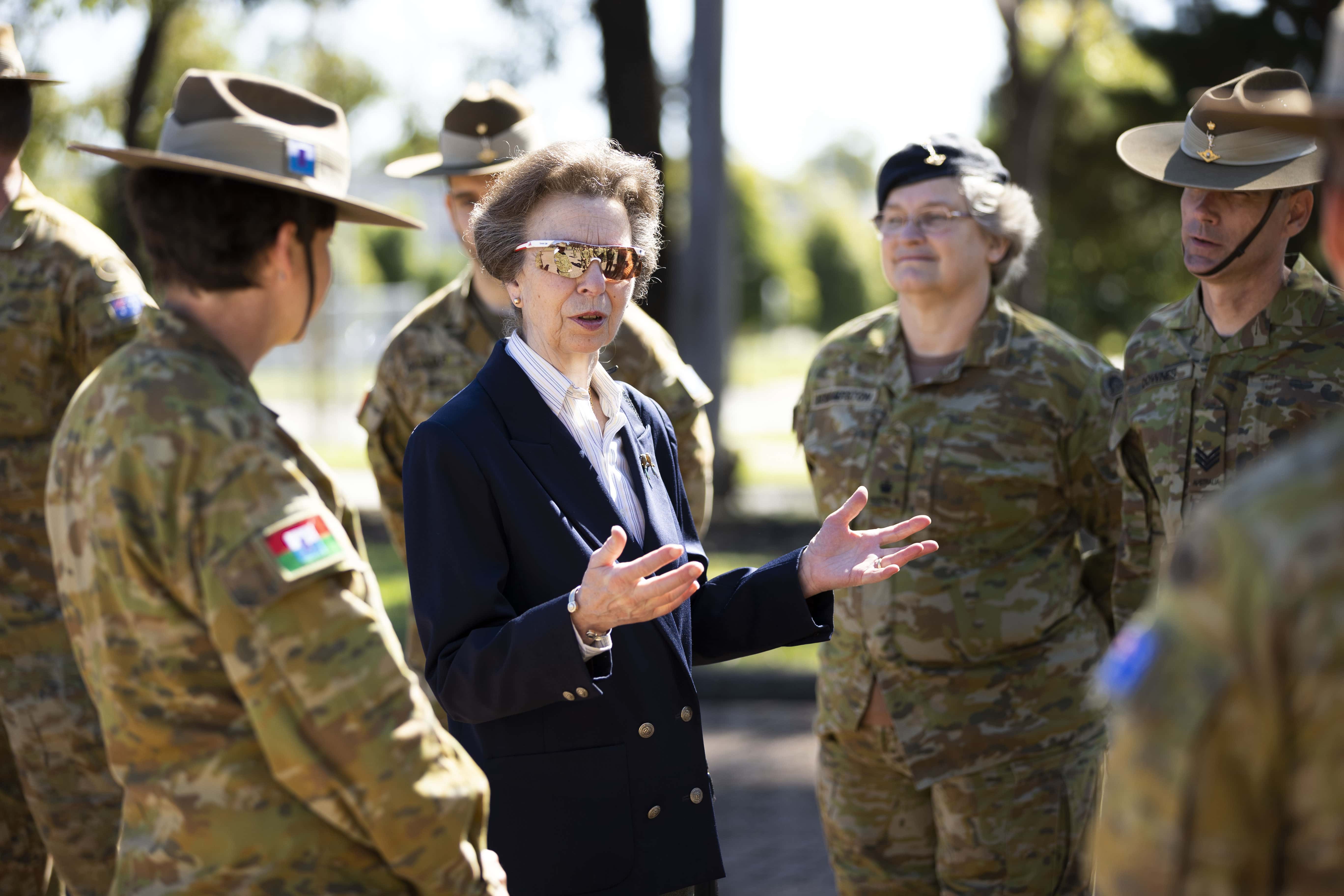 In this handout photo issued by the Australian Department of Defence, Princess Anne, Princess Royal, talks with Australian Army soldiers from 145th Signal Squadron during her visit to Holsworthy Barracks  on April 9, 2022 in Sydney, Australia. Her Royal Highness Princess Anne, The Princess Royal is on a three-day visit to Sydney on behalf of the Queen in celebration of Her Majesty's Platinum Jubilee.
