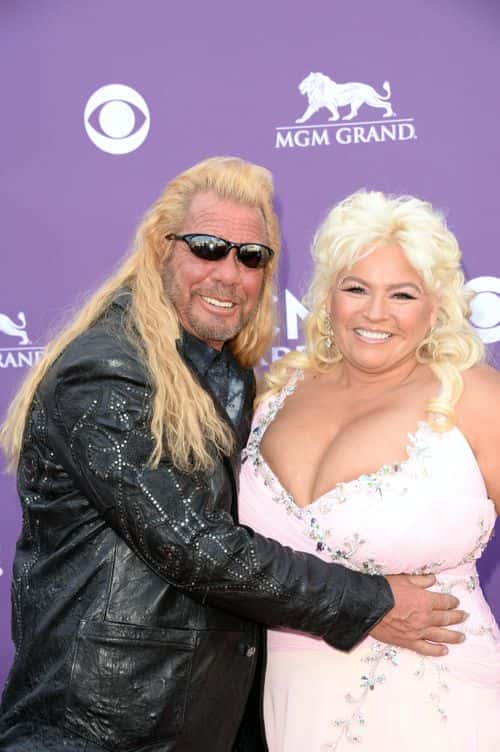 TV personalities Dog the Bounty Hunter (L) and Beth Chapman arrive at the 48th Annual Academy of Country Music Awards at the MGM Grand Garden Arena on April 7, 2013 in Las Vegas, Nevada.