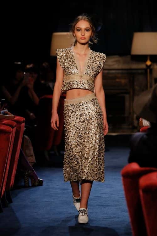 Lily-Rose Depp showcases designs by CHANEL on the runway during the CHANEL Metiers D'art Collection Paris Cosmopolite show at the Tsunamachi Mitsui Club on May 31, 2017 in Tokyo, Japan.