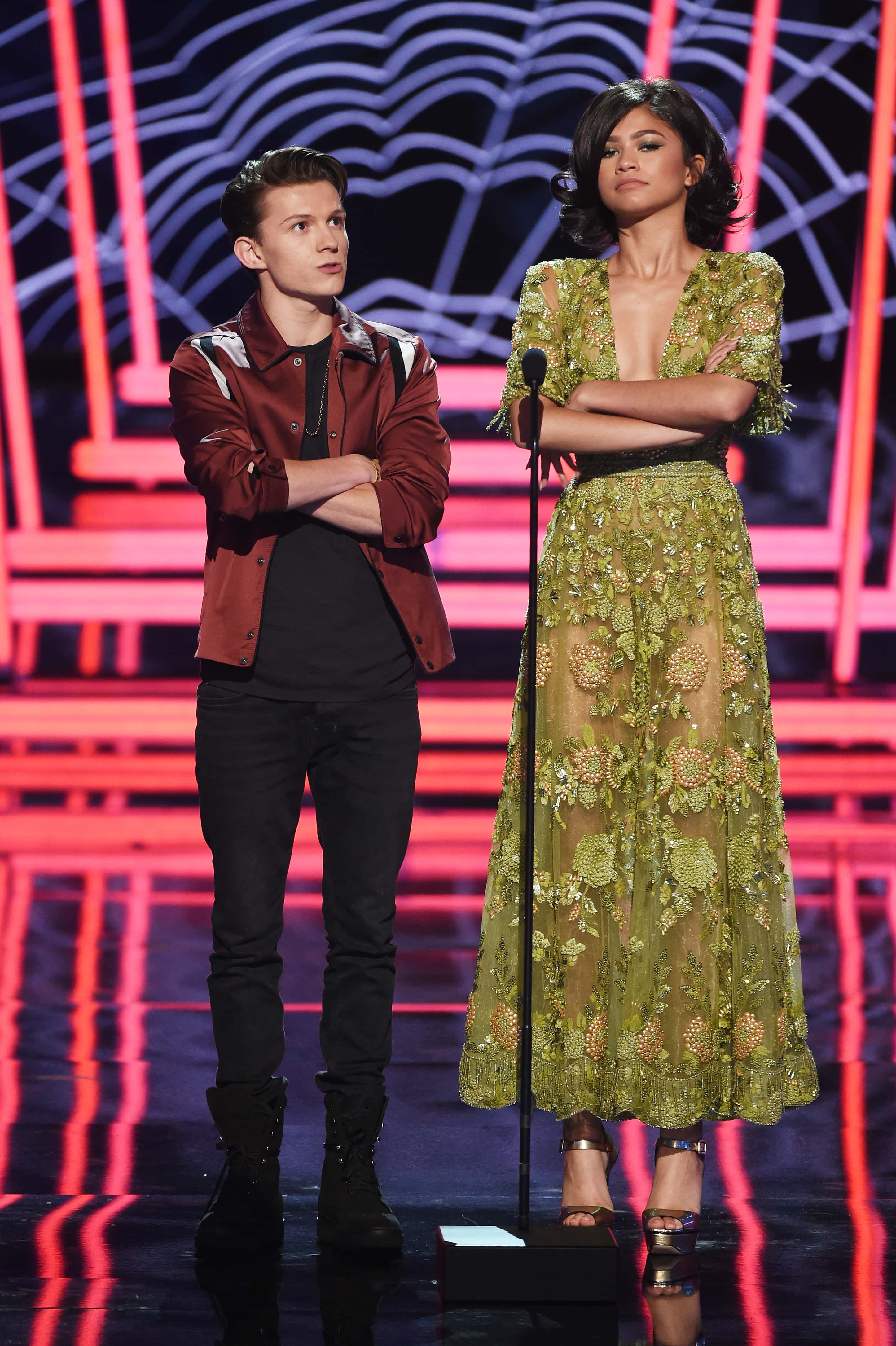 LOS ANGELES, CA - MAY 07: Actors Tom Holland (L) and Zendaya speak onstage during the 2017 MTV Movie And TV Awards at The Shrine Auditorium on May 7, 2017 in Los Angeles, California. (Photo by Kevin Winter/Getty Images)