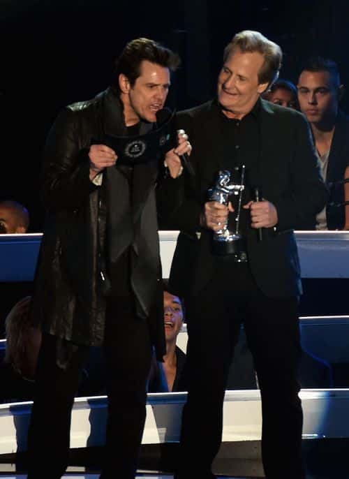 Actors Jim Carrey (L) and Jeff Daniels speak onstage during the 2014 MTV Video Music Awards at The Forum on August 24, 2014 in Inglewood, California.