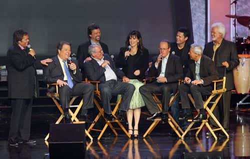 (L-R) Entertainers Jimmy Osmond, Alan Osmond, Tom Osmond, Jay Osmond, Marie Osmond, Virl Osmond, Donny Osmond, Wayne Osmond, and Merrill Osmond, joke around during a meet and greet with fans at the Orleans Hotel & Casino August 13, 2007 in Las Vegas, Nevada. The members of the Osmond family have reunited to film a television special for PBS called,