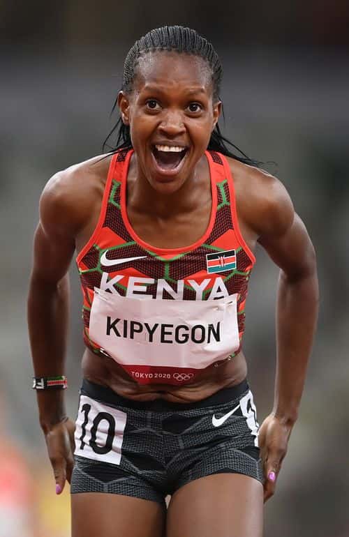 Faith Kipyegon of Team Kenya reacts after winning the gold medal during the Women's 1500 metres final on day fourteen of the Tokyo 2020 Olympic Games at Olympic Stadium on August 06, 2021 in Tokyo, Japan.