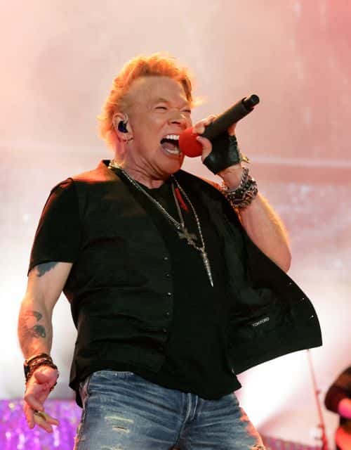 Axl Rose of Guns N' Roses  performs onstage with Carrie Underwood during Day 2 of the 2022 Stagecoach Festival at the Empire Polo Field on April 30, 2022 in Indio, California.