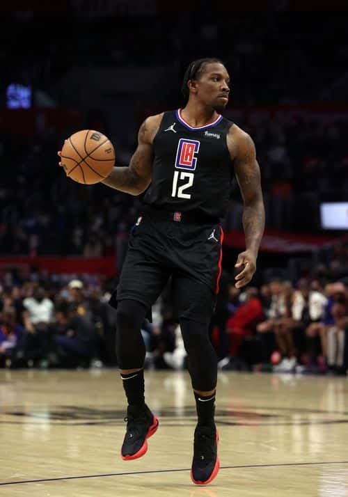 Eric Bledsoe #12 of the LA Clippers in the fourth quarter at Staples Center on October 27, 2021 in Los Angeles, California.  NOTE TO USER: User expressly acknowledges and agrees that, by downloading and/or using this Photograph, user is consenting to the terms and conditions of the Getty Images License Agreement.