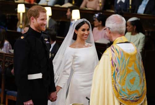 Prince Harry and Meghan Markle during their wedding service, conducted by the Archbishop of Canterbury Justin Welby in St George's Chapel at Windsor Castle on May 19, 2018 in Windsor, England.