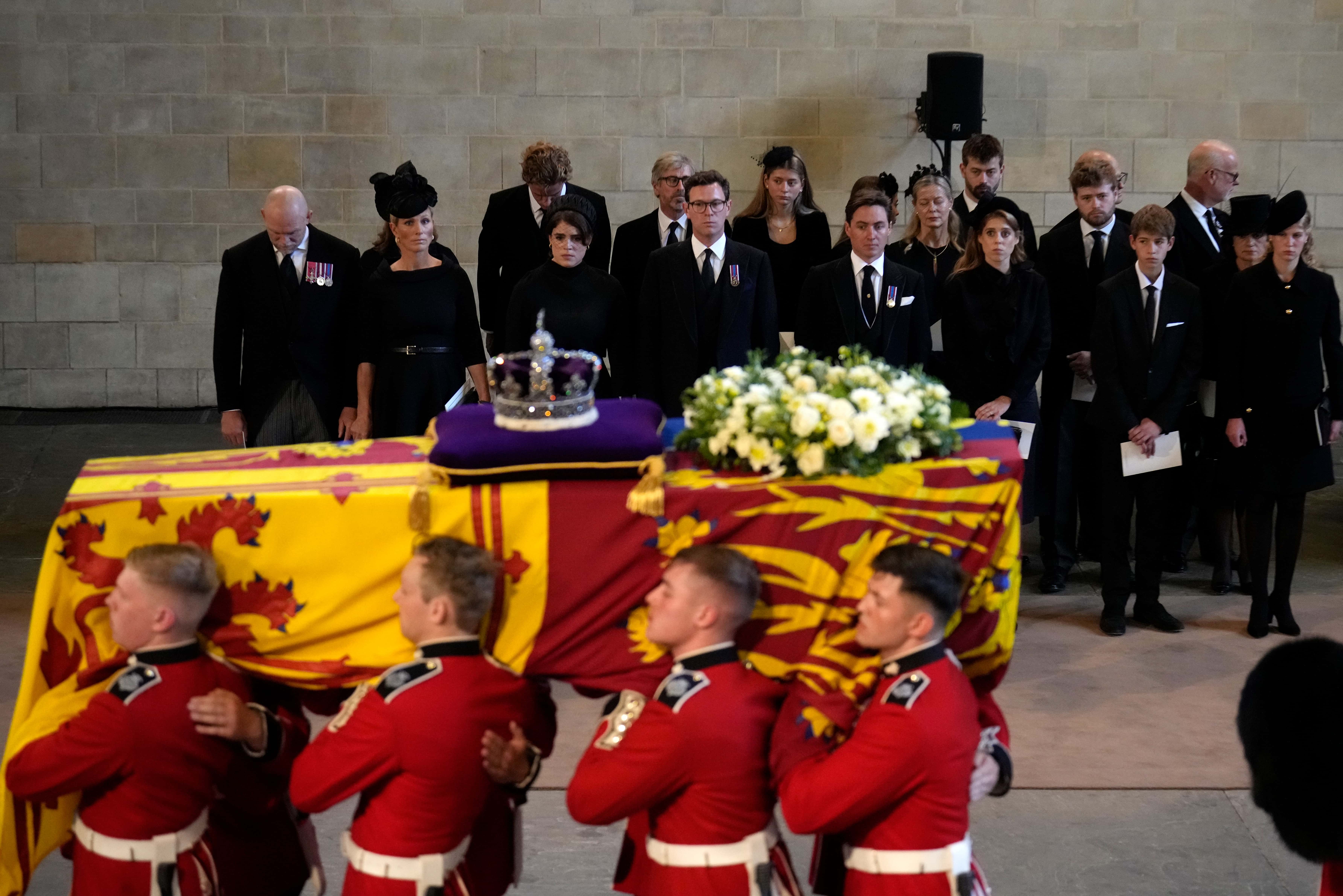 Mike Tindall, Zara Tindall, Princess Eugenie, Princess Beatrice, Edoardo Mapelli Mozzi, Lady Helen Taylor, Princess Beatrice, James, Viscount Severn and Lady Louise Windsor pay their respects as the coffin of Queen Elizabeth II is carried into The Palace of Westminster during the procession for the Lying-in State of Queen Elizabeth II on September 14, 2022 in London, England. Queen Elizabeth II's coffin is taken in procession on a Gun Carriage of The King's Troop Royal Horse Artillery from Buckingham Palace to Westminster Hall where she will lay in state until the early morning of her funeral. Queen Elizabeth II died at Balmoral Castle in Scotland on September 8, 2022, and is succeeded by her eldest son, King Charles III.