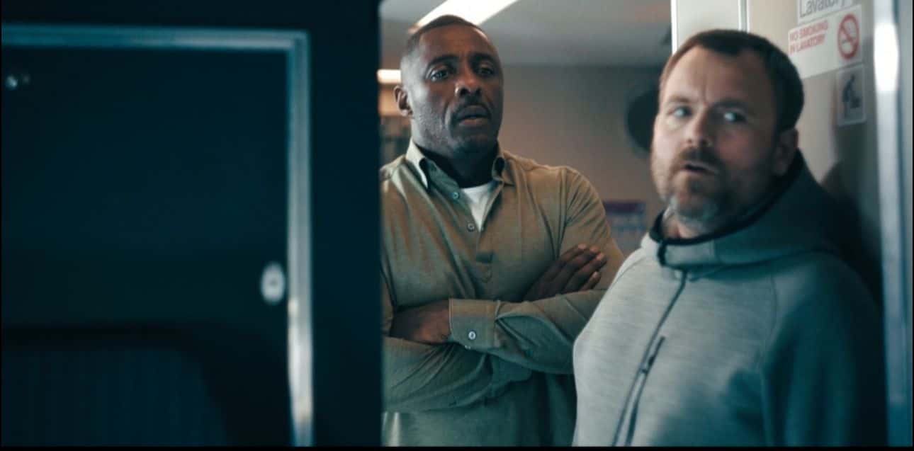 A still from 'Hijack' starring Idris Elba as Sam Nelson and Neil Maskell as Stuart (Apple TV+)