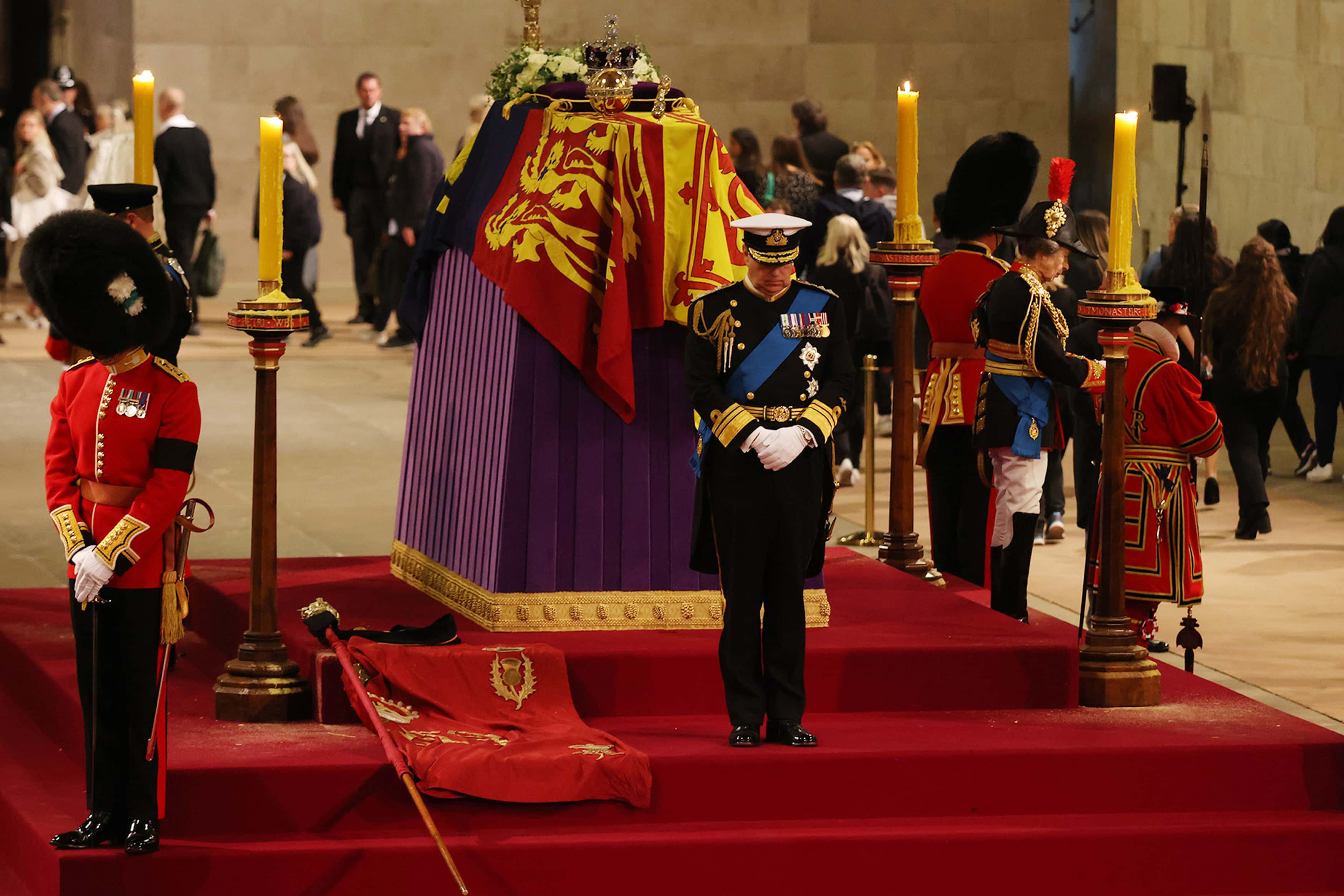 Prince Andrew, Duke of York (C) holds a vigil beside the coffin of his mother, Queen Elizabeth II, as it lies in state on the catafalque in Westminster Hall, at the Palace of Westminster, ahead of her funeral on Monday, on September 16, 2022 in London, England.