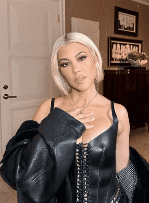 Kourtney about to go watch a UFC fight at the T-Mobile Arena with husband Travis Baker (Instagram/@kourtneykardashian)