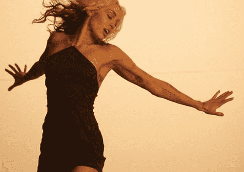 Miley Cyrus sings about her heartbreak with Liam Hemsworth, dancing with 14 shirtless men in a steamy music video for her new track River (Instagram/@mileycyrus)