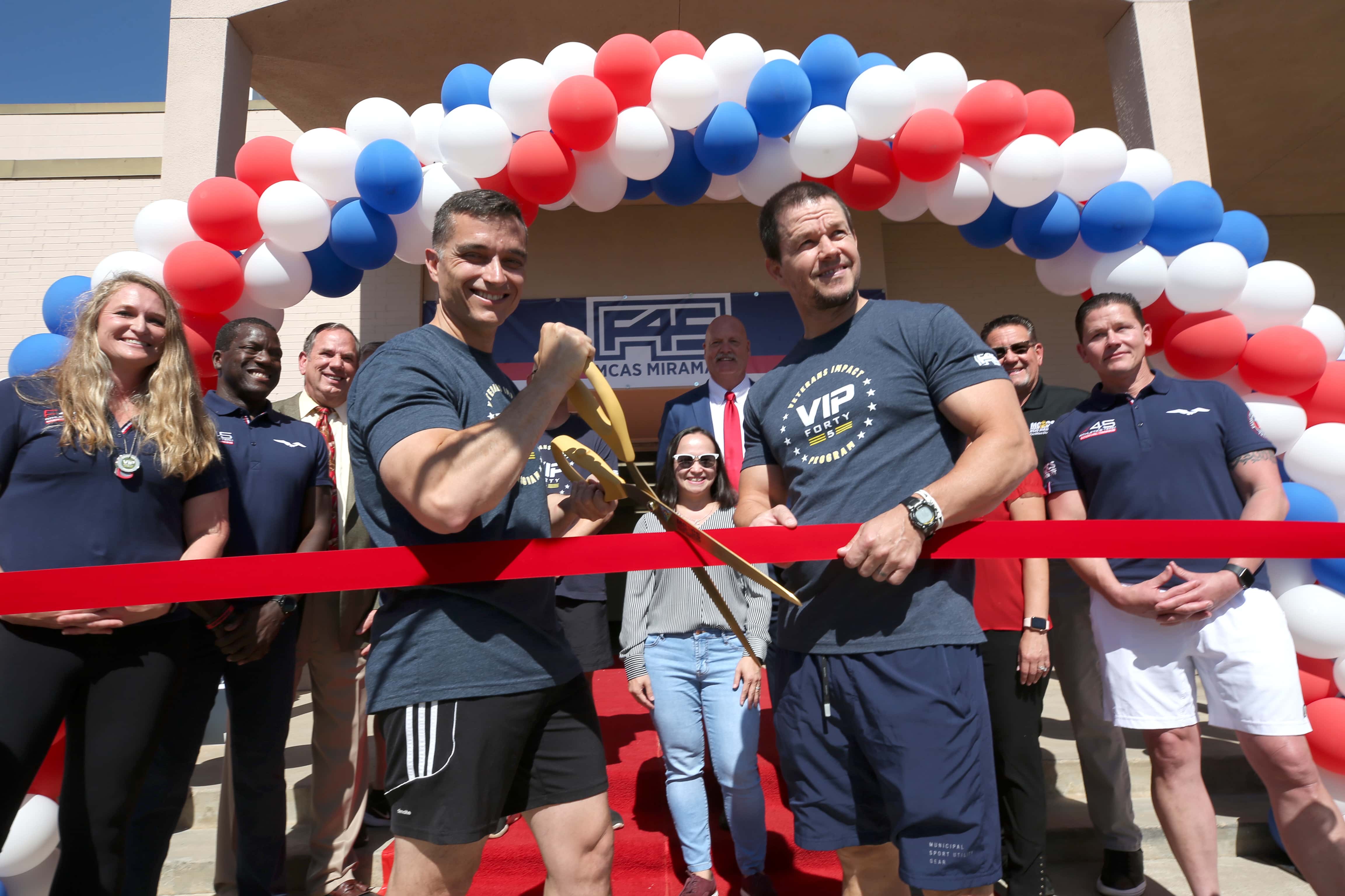 SAN DIEGO, CALIFORNIA - JUNE 11: Colonel Charles B. Dockery and Mark Wahlberg attend the opening of F45 Training at Miramar MCAs, the first fitness franchise on a US military base on June 11, 2021 in San Diego, California. (Photo by Phillip Faraone/Getty Images for F45 Training)
