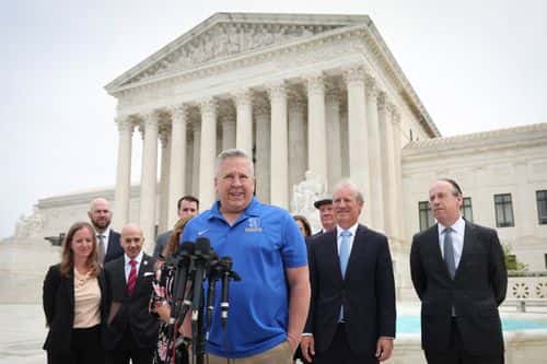 Former Bremerton High School assistant football coach Joe Kennedy answers questions after his legal case, Kennedy vs. Bremerton School District, was argued before the Supreme Court on April 25, 2022 in Washington, DC. Kennedy was terminated from his job by Bremerton public school officials in 2015 after refusing to stop his on-field prayers after football games.