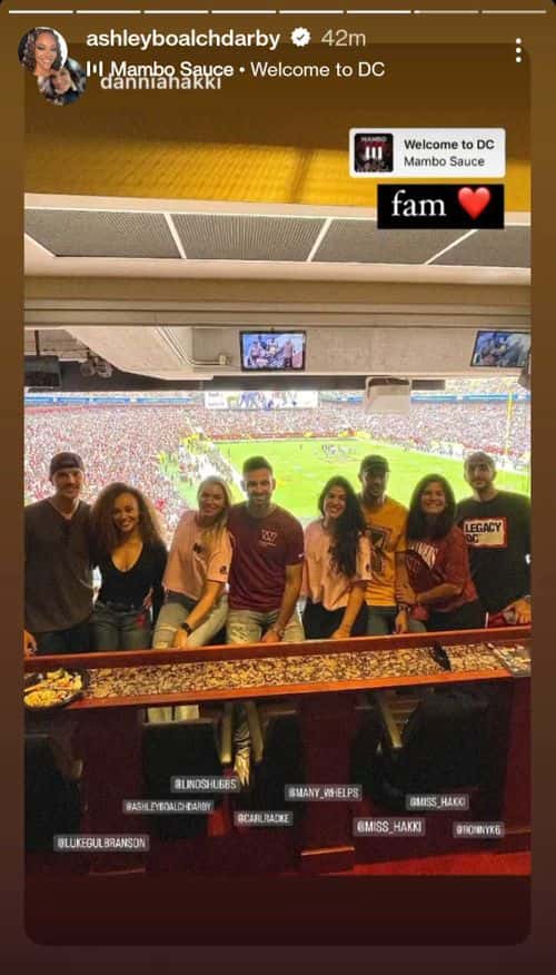 Ashley Darby and Luke Gulbranson with a few friends at the Washington Commanders vs Vikings football game (@ashleyboalchdarby/Instagram)