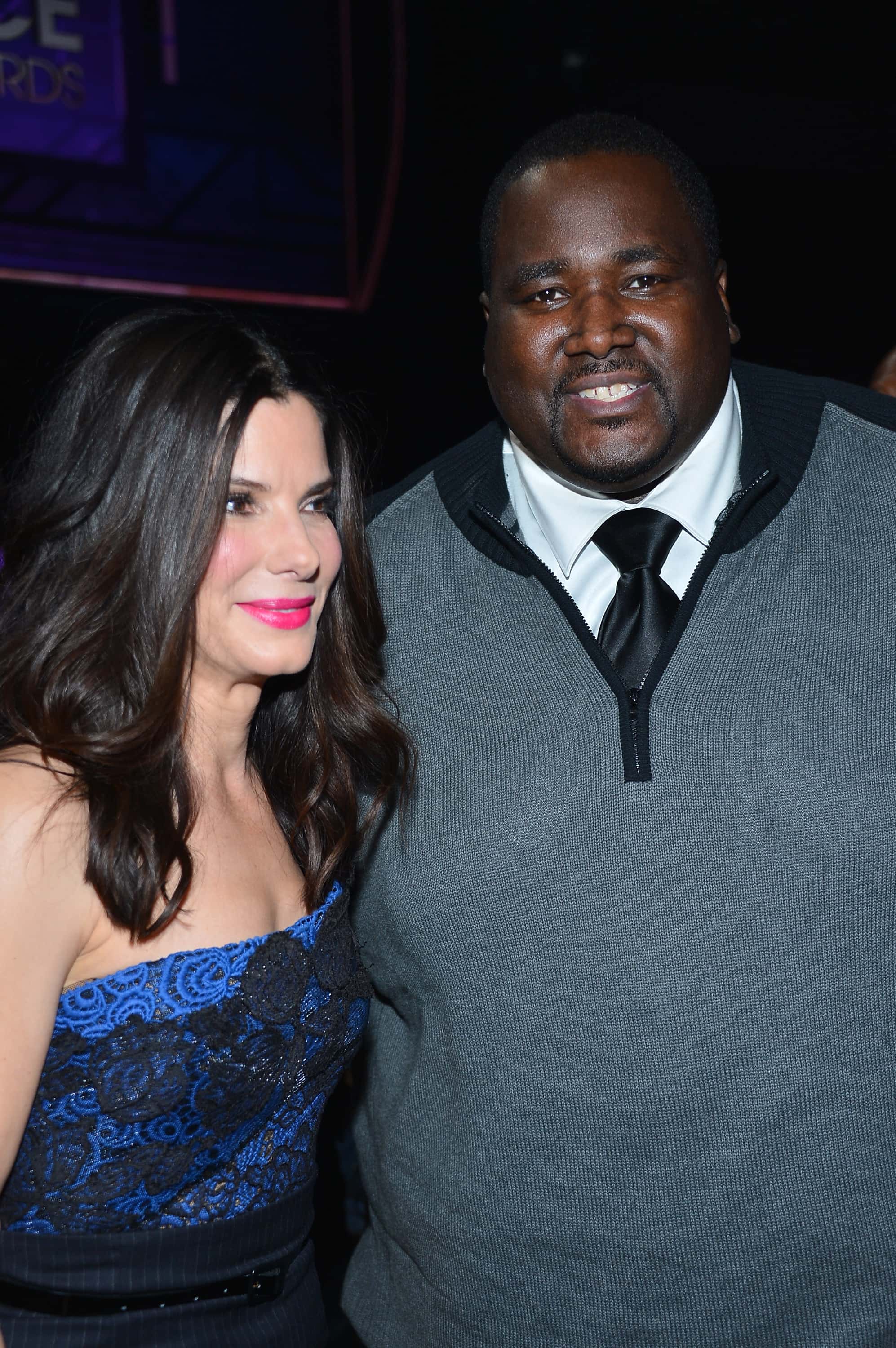 Actress Sandra Bullock (L) and actor Quinton Aaron attend the 39th Annual People's Choice Awards at Nokia Theatre L.A. Live on January 9, 2013 in Los Angeles, California.