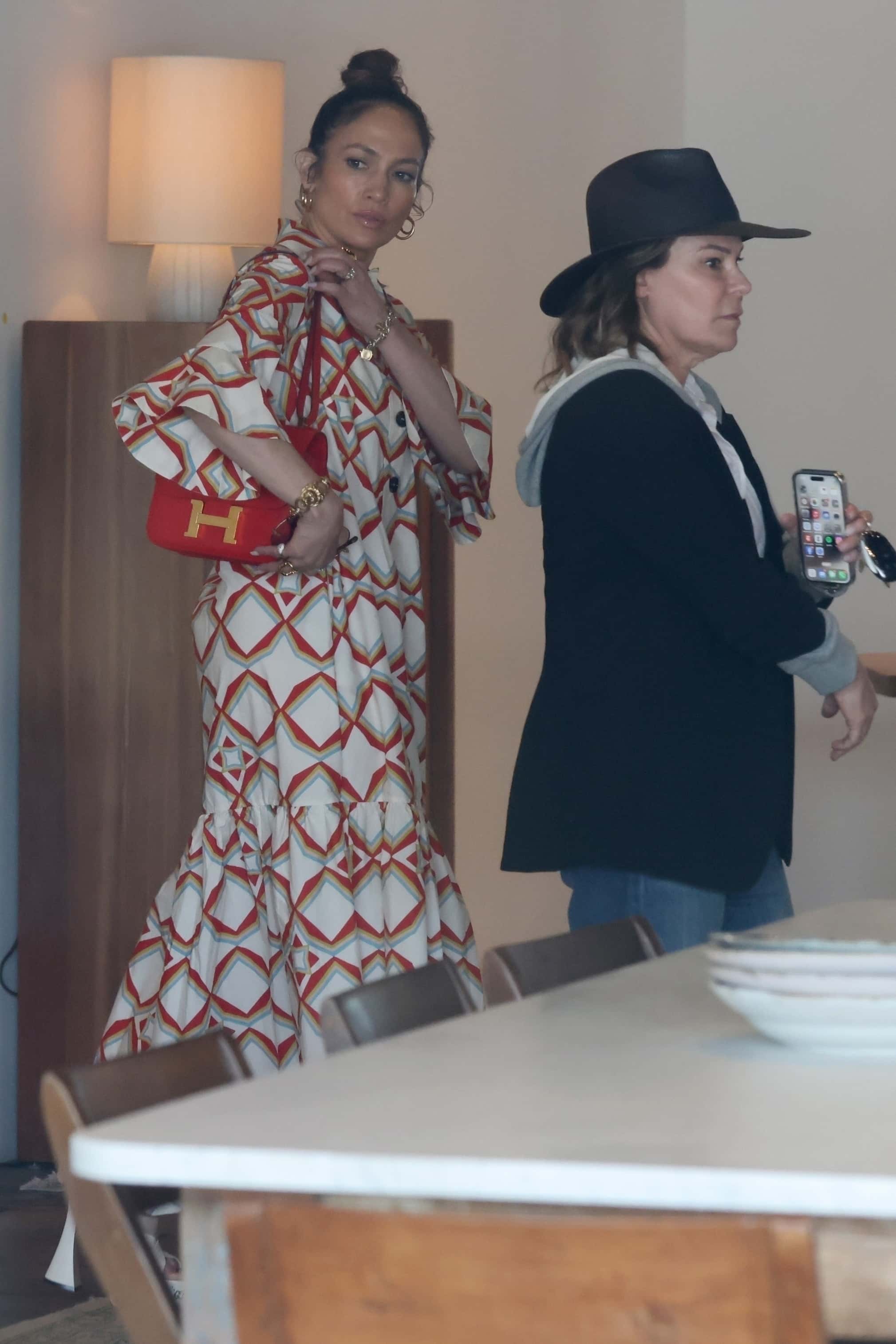 The Mother star was seen carrying a red Hermes shoulder purse (Backgrid)