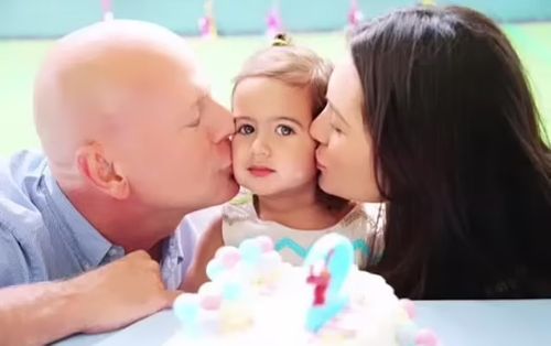 Emma was focused on the family's happier moments, sharing pictures that included one of her and Bruce kissing Mabel's cheeks (emmahemmingwillis)