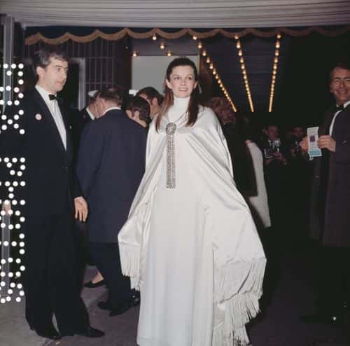 Canadian actress Geneviève Bujold arrives at the Odeon Leicester Square in London for the premiere of the film 'Anne of the Thousand Days', 23rd February 1970. She plays Anne Boleyn, mother of Queen Elizabeth I, in the film. (Photo by Tim Graham/Fox Photos/Hulton Archive/Getty Images)