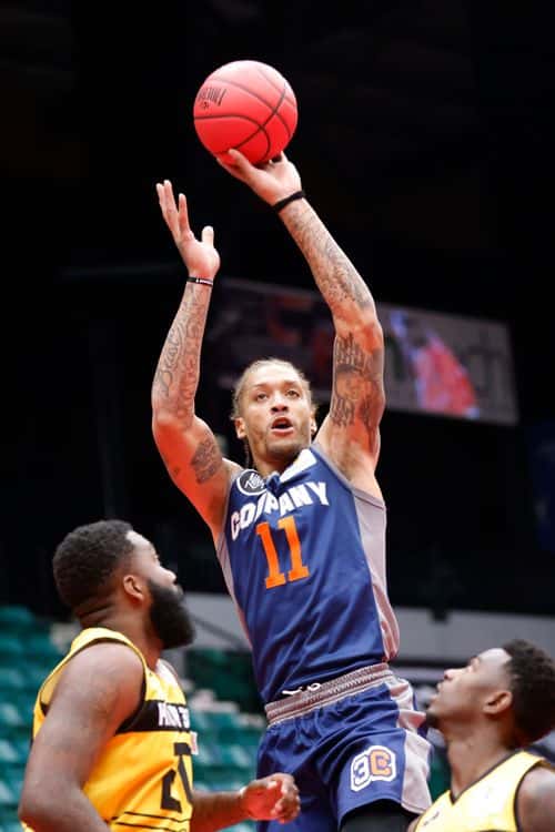 Michael Beasley #11 of 3's Company shoots against Donte Green #20 of the Killer 3's during BIG3 Week Seven at Comerica Center on July 30, 2022 in Frisco, Texas.