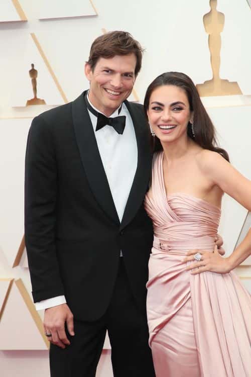 (L-R) Ashton Kutcher and Mila Kunis attend the 94th Annual Academy Awards at Hollywood and Highland on March 27, 2022 in Hollywood, California.