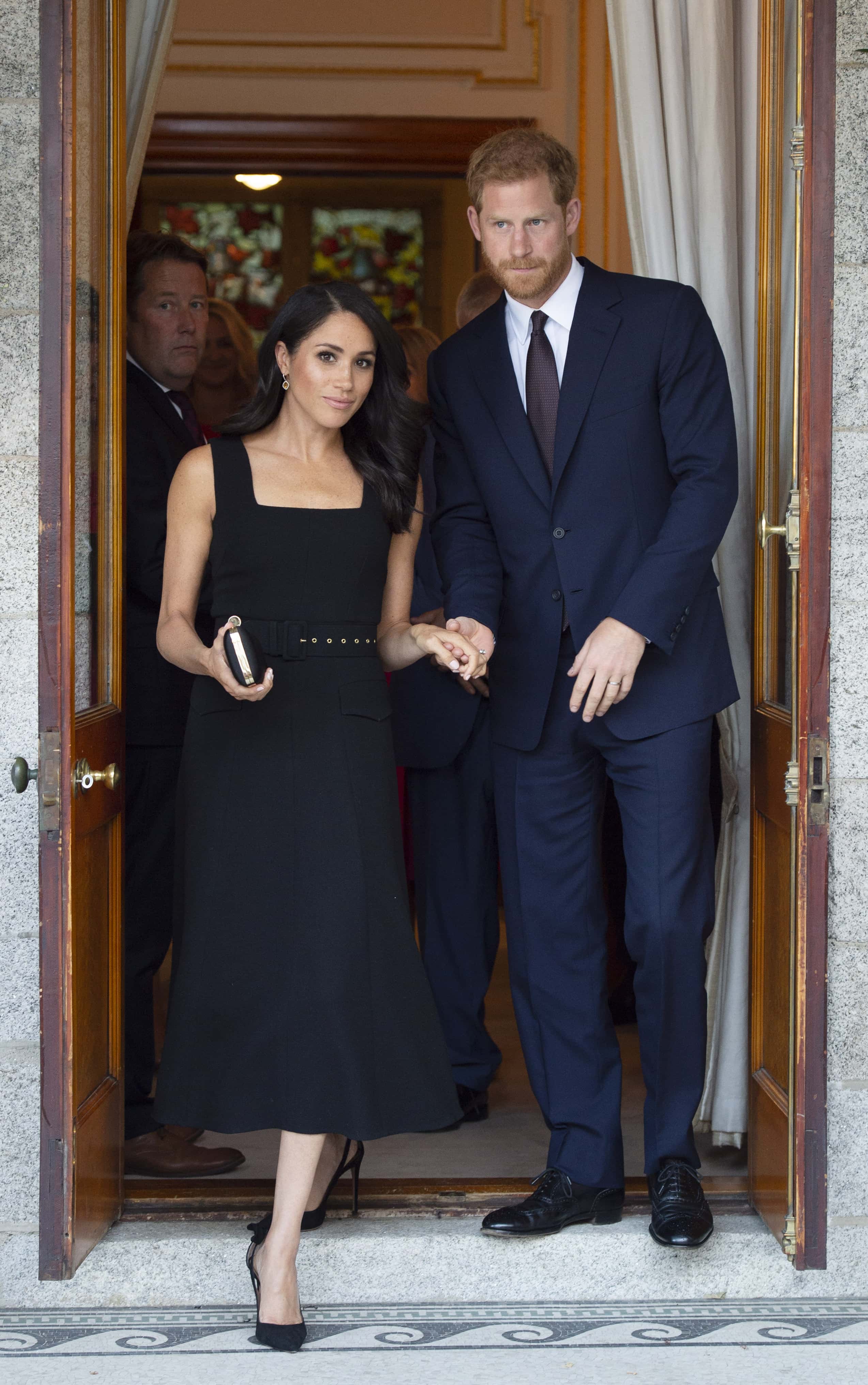 Prince Harry, Duke of Sussex and Meghan, Duchess of Sussex attend a reception at Glencairn, the residence of Robin Barnett, the British Ambassador to Ireland during day one of their visit to Ireland on July 10, 2018 in Dublin, Ireland. (Photo by Geoff Pugh - WPA Pool/Getty Images)