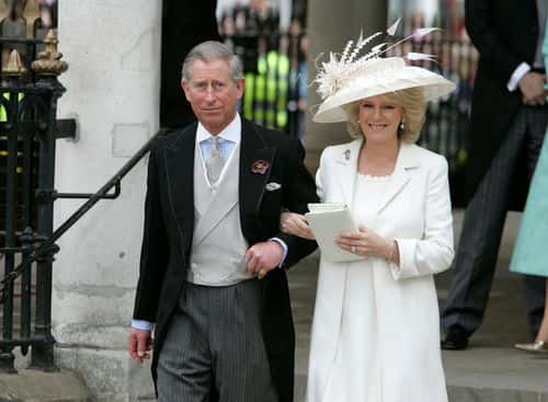TRH Prince Charles, the Prince of Wales, and his wife Camilla, the Duchess of Cornwall, depart the Civil Ceremony where they were legally married, at The Guildhall, Windsor on April 9, 2005 in Berkshire, England.