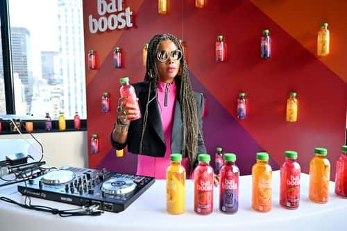 Kelis poses during the DJ Workshop and Good Energy Happy Hour event hosted by Bai Boost with Kelis and Coco & Breezy at The Daintree Rooftop on August 30, 2022 in New York City. (Photo by Bryan Bedder/Getty Images for Bai Boost)