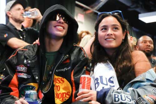 Pete Davidson and Chase Sui attend the drivers meeting prior to the NASCAR Cup Series 65th Annual Daytona 500 at Daytona International Speedway on February 19, 2023 in Daytona Beach, Florida.