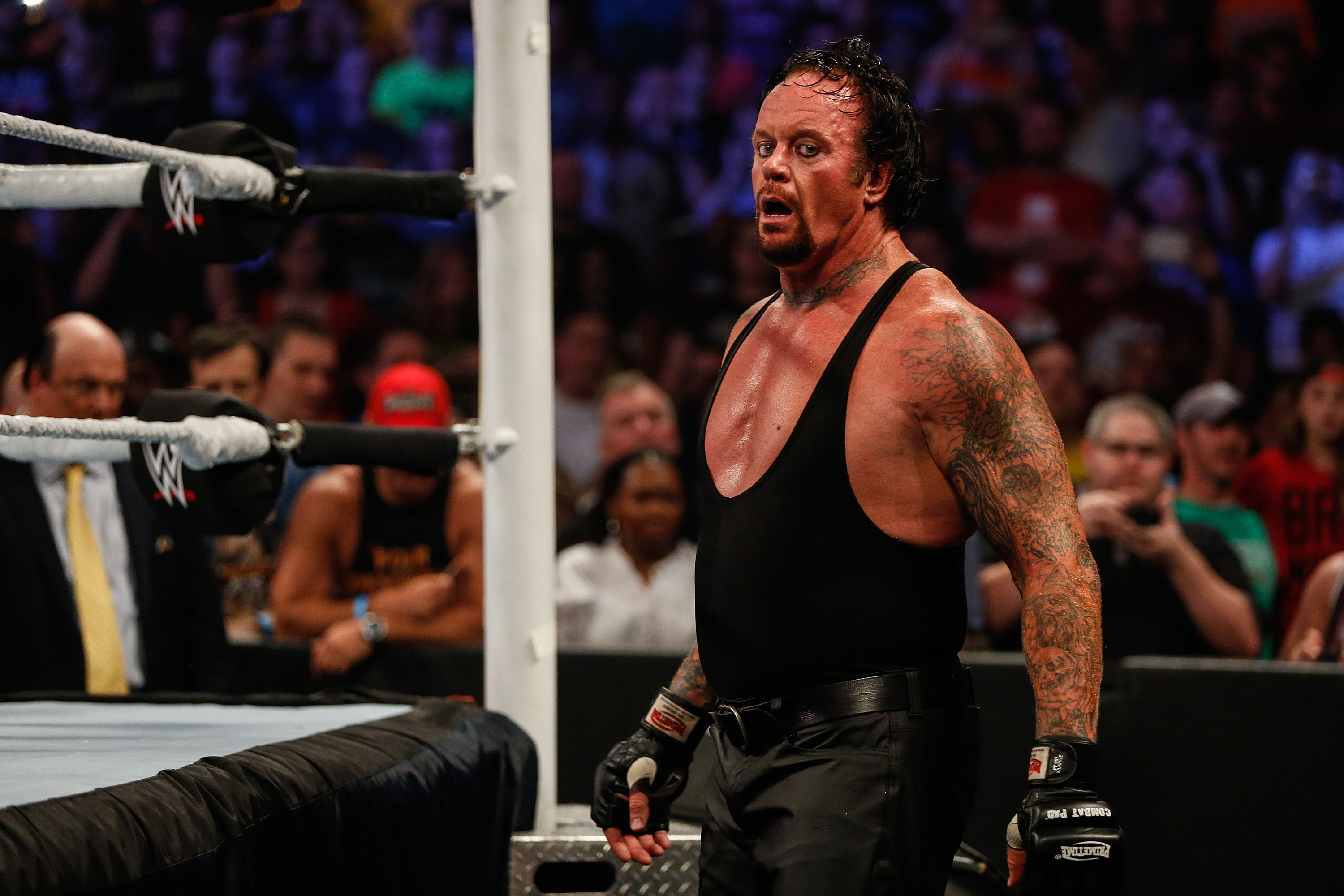 The Undertaker recovers during his fight against Brock Lesner at the WWE SummerSlam 2015 at Barclays Center of Brooklyn in New York City. (Photo by JP Yim/Getty Images)