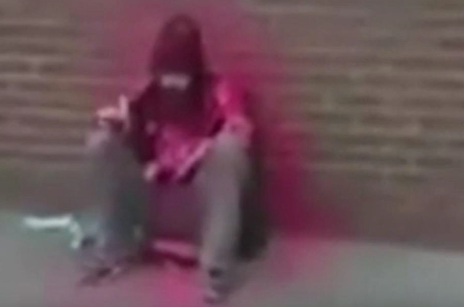 The homeless man who was spraypainted was identified as Michael Cash (Source: YouTube)