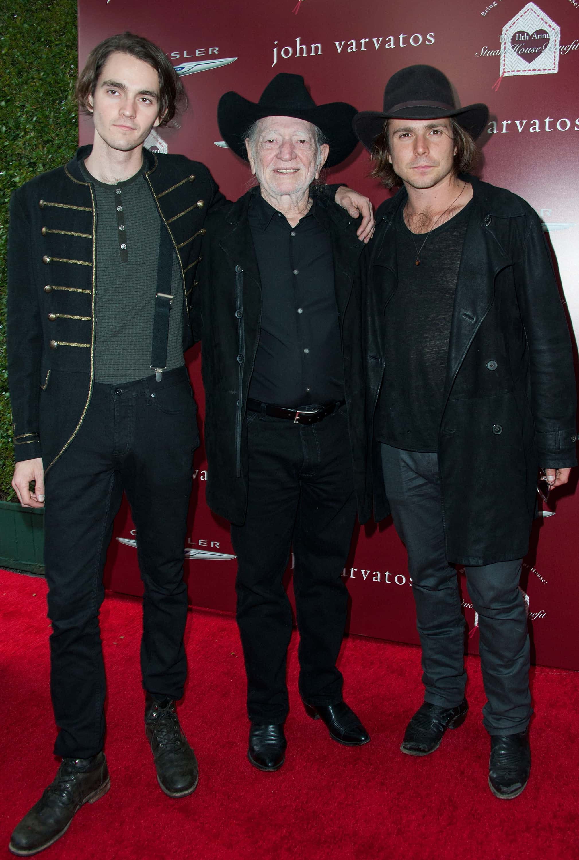(L-R) Musician Micah Nelson, musician Willie Nelson, and musician Lukas Nelson arrive at the 11th Annual John Varvatos Stuart House Benefit  at John Varvatos on April 13, 2014 in Los Angeles, California.