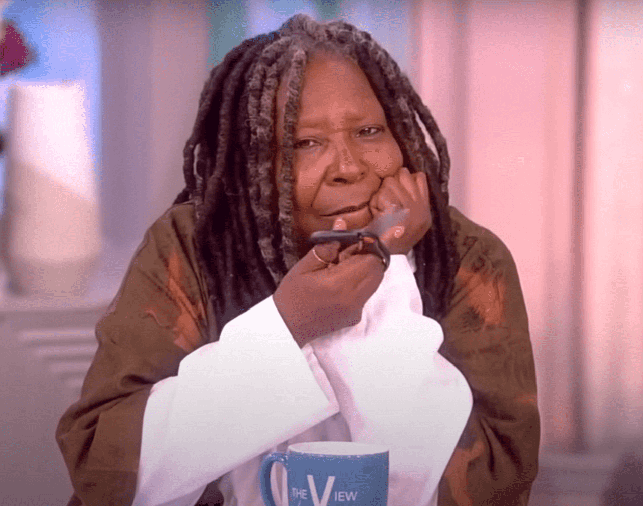 Whoopi Goldberg pulls out a pair of scissors on 'The View' (YouTube/TheView)