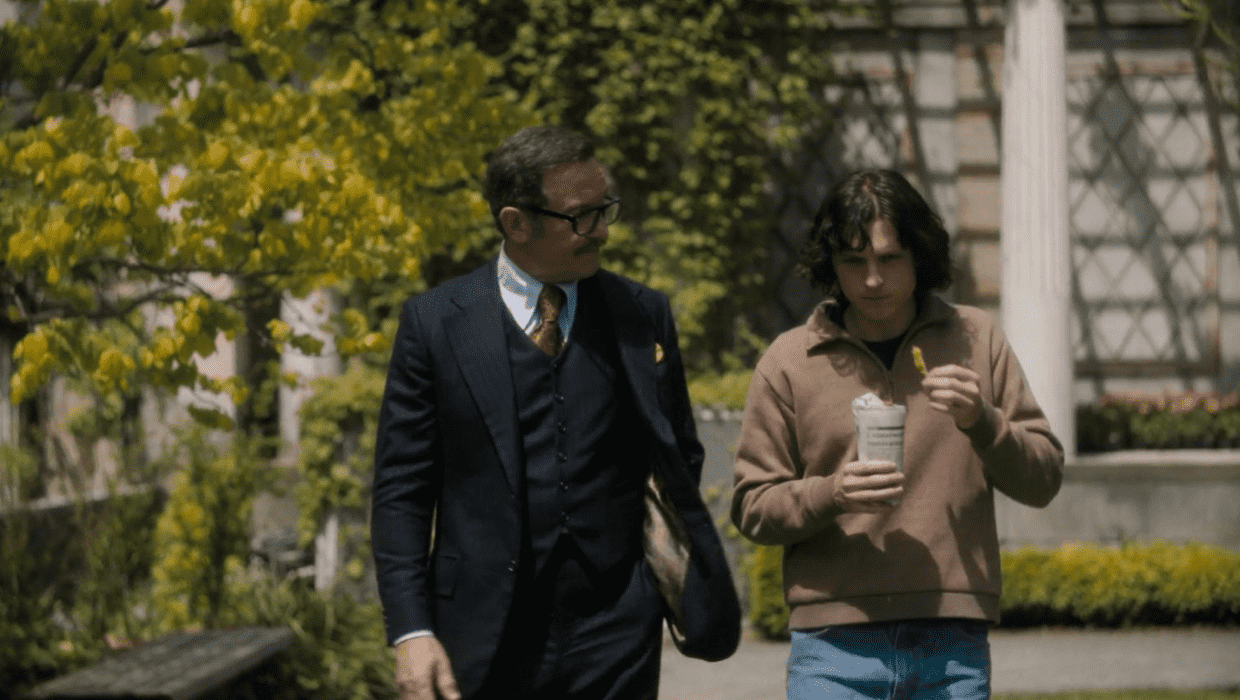 A still from 'The Crowded Room' starring Tom Holland as Danny Sullivan and Jason Issacs as Jack (Apple TV+)