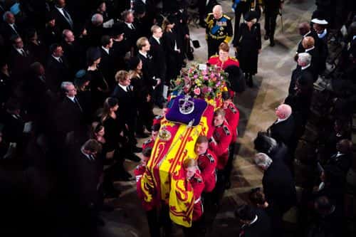 King Charles III and Camilla, Queen Consort follow behind the coffin of Queen Elizabeth II as it is carried into St George's Chapel in Windsor Castle, for the Committal Service on September 19, 2022 in Windsor, England. The committal service at St George's Chapel, Windsor Castle, took place following the state funeral at Westminster Abbey. A private burial in The King George VI Memorial Chapel followed. Queen Elizabeth II died at Balmoral Castle in Scotland on September 8, 2022, and is succeeded by her eldest son, King Charles III.