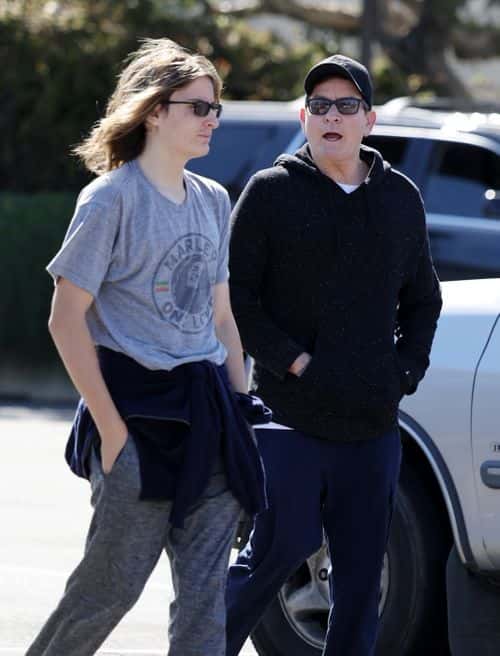 Sheen kept the smoothie run casual in a black hoodie that he paired with blue sweatpants. (backgrid)