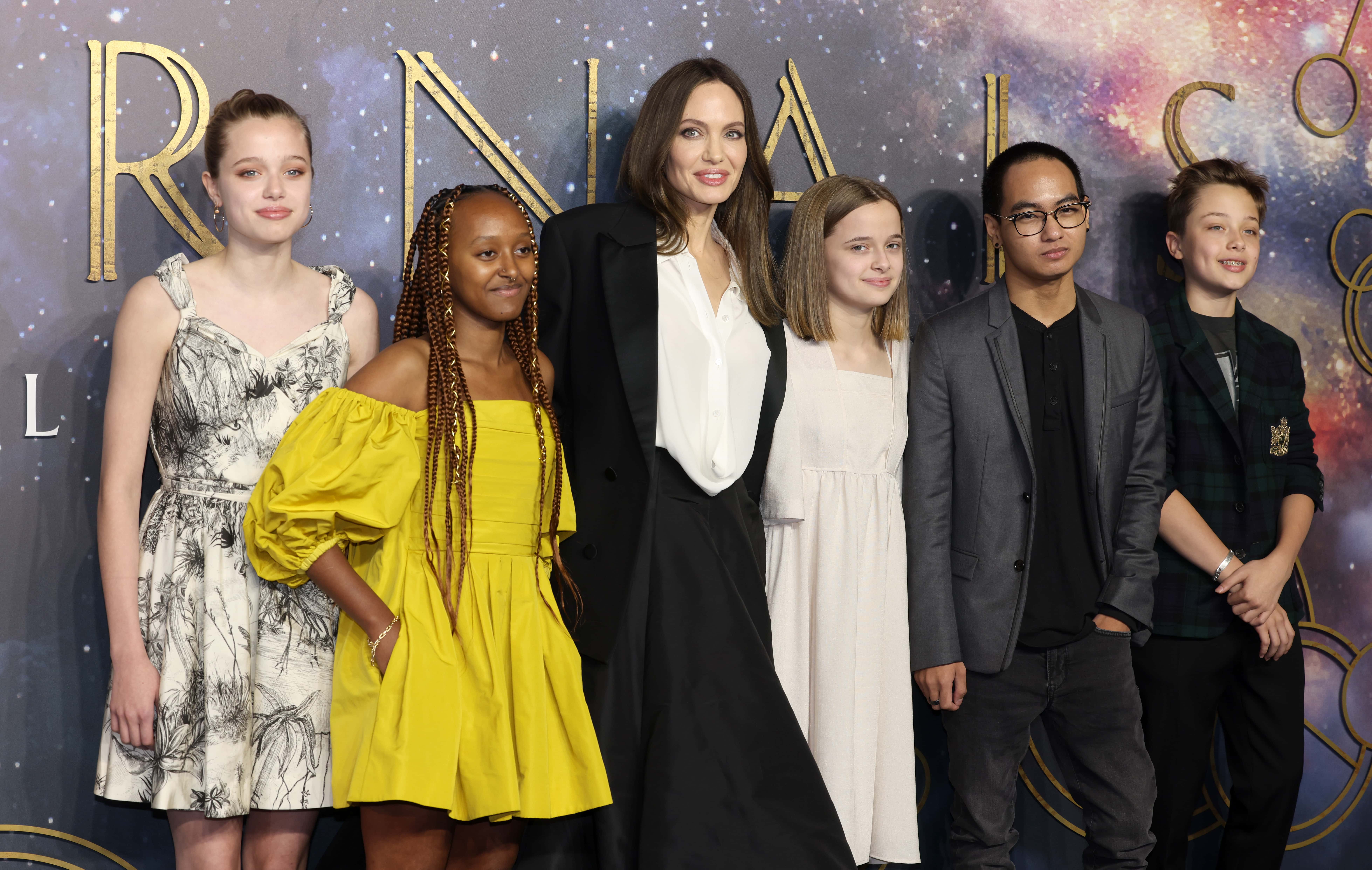 (L to R) Shiloh Jolie-Pitt, Zahara Jolie-Pitt, Angelina Jolie, Vivienne Jolie-Pitt, Maddox Jolie-Pitt and Knox Jolie-Pitt attend the