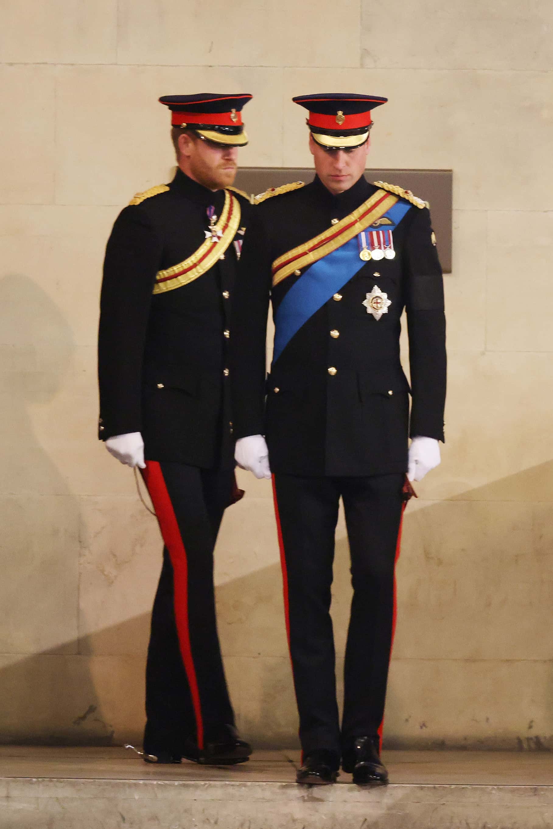 Prince William, Prince of Wales, Prince Harry, Duke of Sussex arrive to hold a vigil in honour of Queen Elizabeth II at Westminster Hall on September 17, 2022 in London, England. Queen Elizabeth II's grandchildren mount a family vigil over her coffin lying in state in Westminster Hall. Queen Elizabeth II died at Balmoral Castle in Scotland on September 8, 2022, and is succeeded by her eldest son, King Charles III.