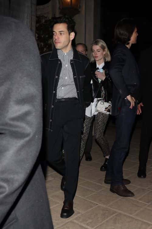 Rami Malek and Lucy Boynton snapped outside Leo's party. (Backgrid)