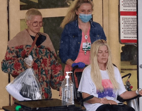 The actress, 50, looked worse for wear as she was wheeled out of the hospital 