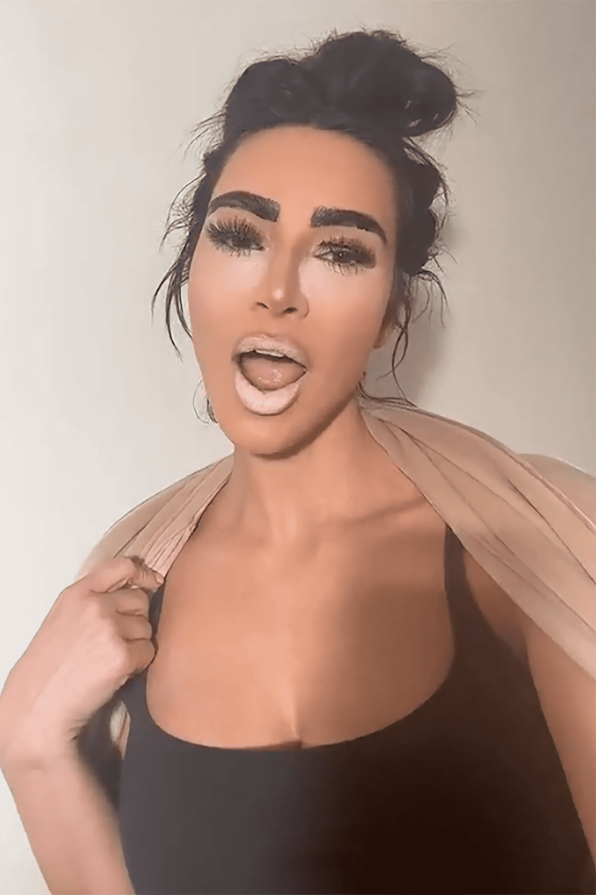 Kim Kardashian uses Kylie Cosmetics for 'bad makeup' TikTok trend (TikTok/@kimkardashian)