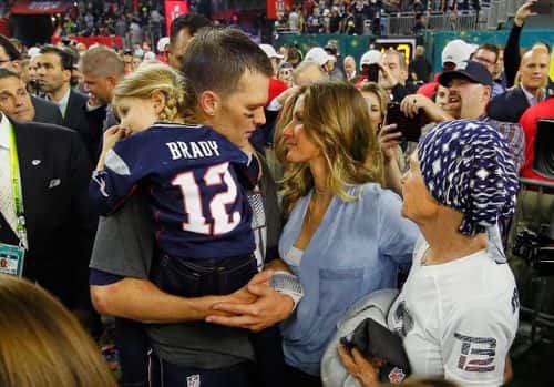Tom Brady #12 of the New England Patriots celebrates with wife Gisele Bundchen and daughter Vivian Brady after defeating the Atlanta Falcons during Super Bowl 51 at NRG Stadium on February 5, 2017 in Houston, Texas. The Patriots defeated the Falcons 34-28.