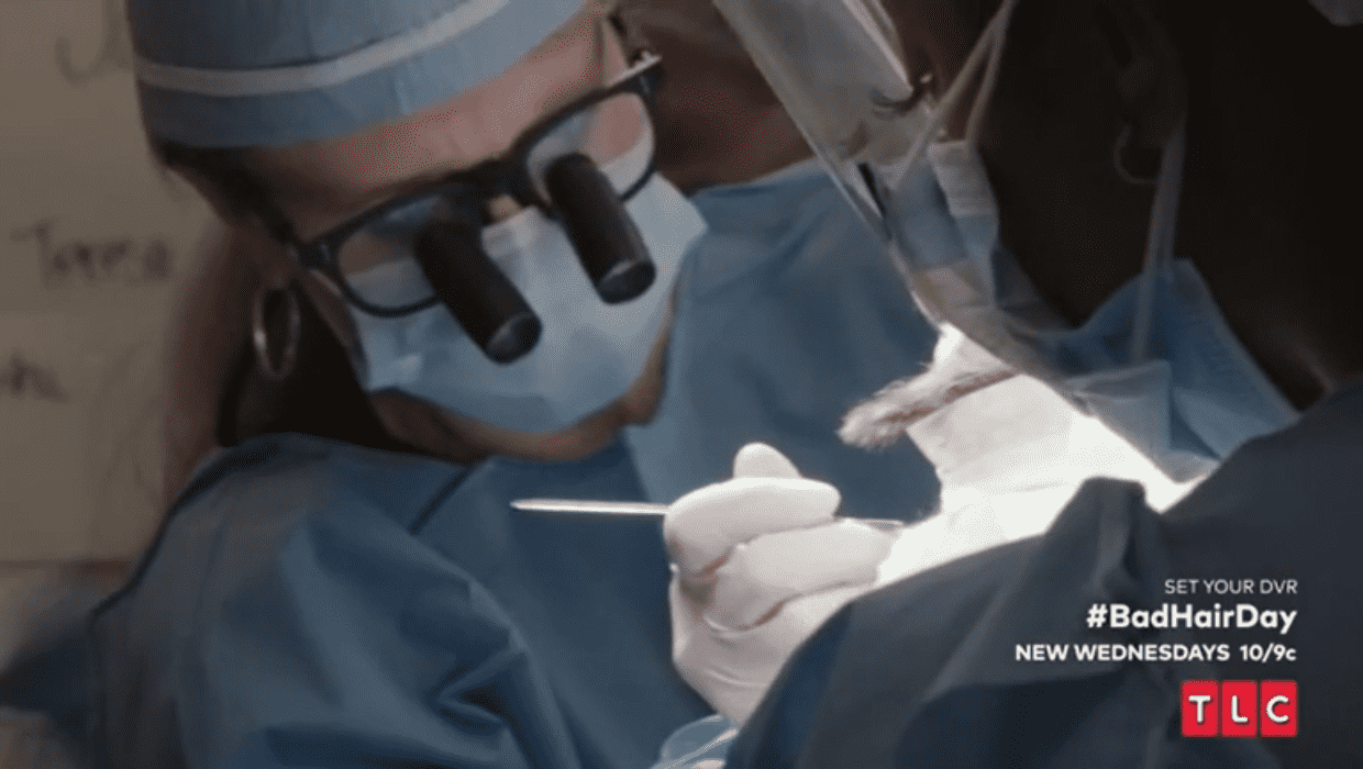 Dr Angie performing surgery on her patient, Jamie in 'Bad Hair Day' Season 1 episode 1 (TLC)