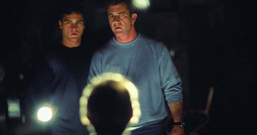 Mel Gibson and Joaquin Phoenix in 'Signs' (Walt Disney Pictures)