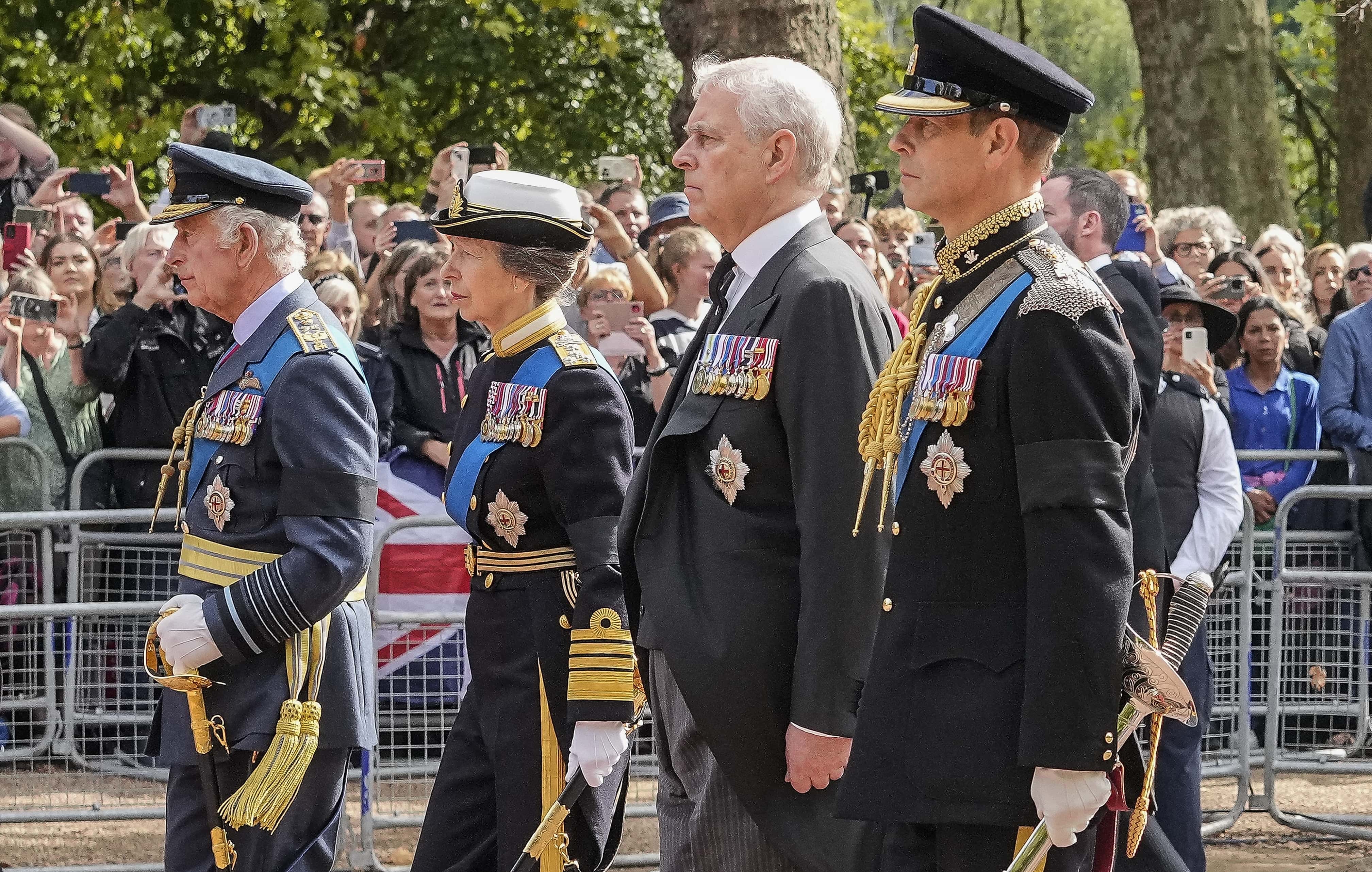 LONDON, ENGLAND - SEPTEMBER 14: King Charles III, Princess Anne, Princess Royal, Prince Andrew, Duke of York and Prince Edward, Earl of Wessex
walk behind the coffin during the ceremonial procession of the coffin of Queen Elizabeth II from Buckingham Palace to Westminster Hall on September 14, 2022 in London, United Kingdom. Queen Elizabeth II's coffin is taken in procession on a Gun Carriage of The King's Troop Royal Horse Artillery from Buckingham Palace to Westminster Hall where she will lay in state until the early morning of her funeral. Queen Elizabeth II died at Balmoral Castle in Scotland on September 8, 2022, and is succeeded by her eldest son, King Charles III. (Photo by Martin Meissner-WPA Pool/Getty Images)