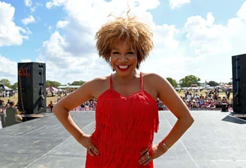 A Tina Turner impersonator poses for a photo during the Queensland Maroons State of Origin fan day on June 01, 2021 in Bundaberg, Australia.