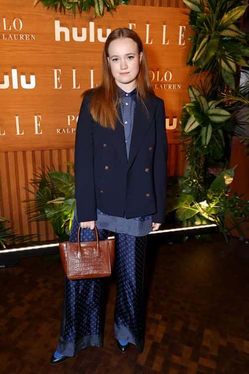 Liv Hewson, wearing Ralph Lauren, attends 